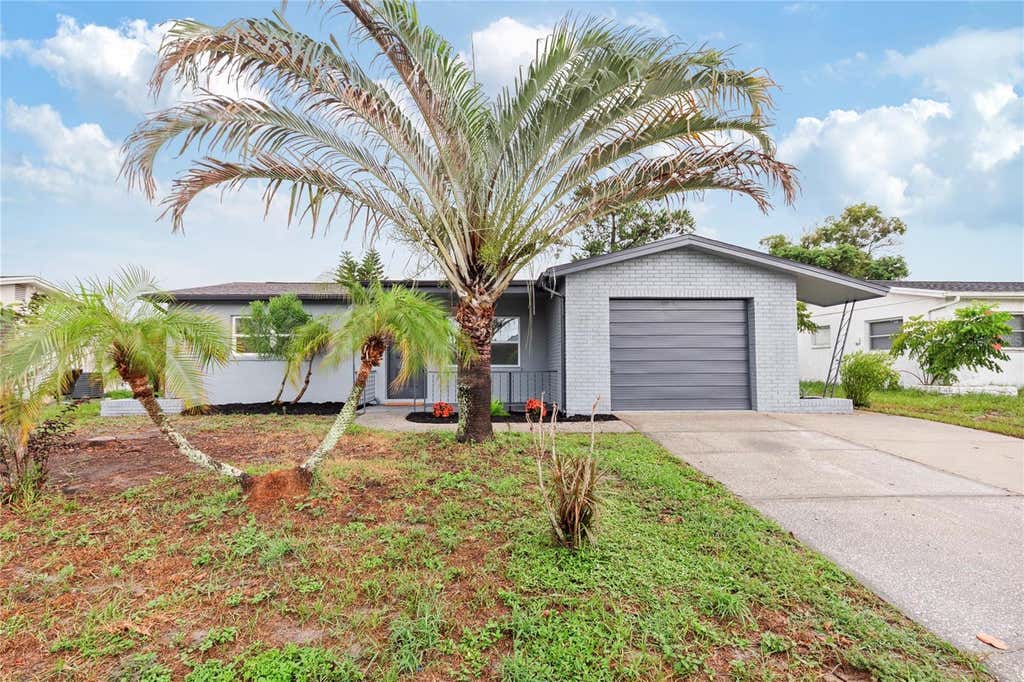 Photo of 9324 Whitman Lane, Port Richey, FL 34668 (MLS # TB8533481)