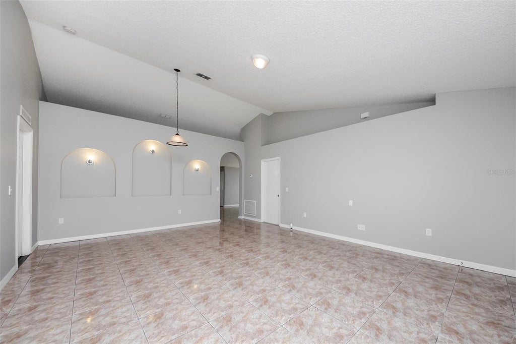 Photo of 609 Rosaro Court, Kissimmee, FL 34758 (MLS # O6449248)