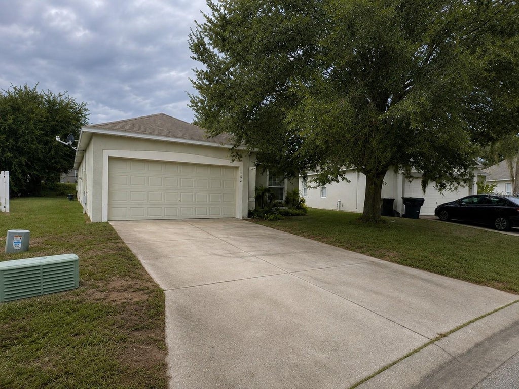 Photo of 164 Sigmund Loop, Davenport, FL 33837 (MLS # S5156856)