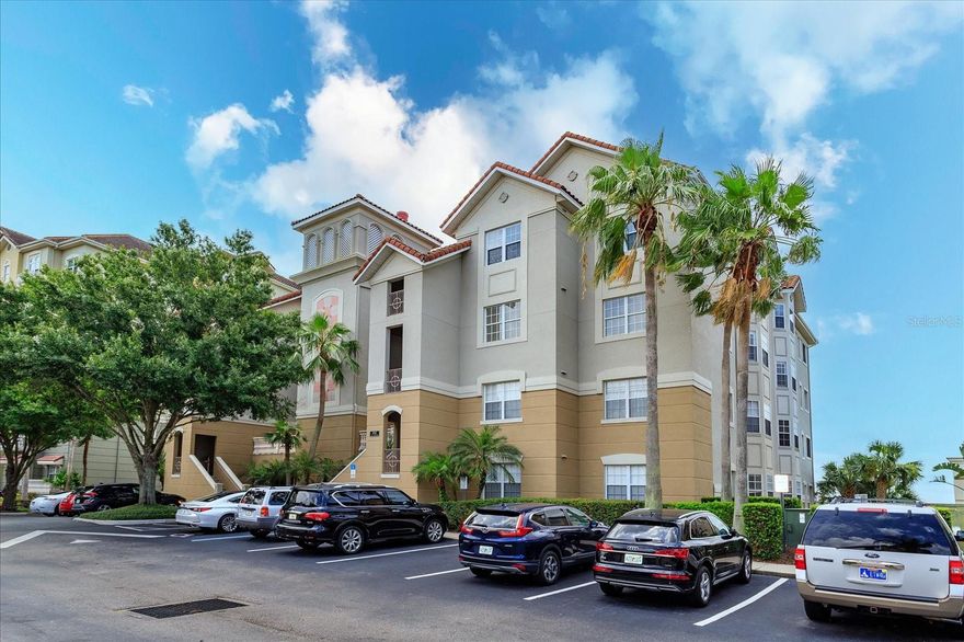 One or more photo(s) has been virtually staged. Nestled in the heart of Central Orlando's popular Vizcaya Heights Condominiums in Dr. Phillips, this freshly painted home eagerly awaits the signature touch of its next owner. Take the elevator to the third floor, turn right to the door at the end. The residence boasts an elegant architectural design, set against the serene backdrop of sweeping water views of the Big Sand Lake that radiate a sense of tranquility and peace from every window. Upon entering, you are greeted by a sense of potential; an open canvas ready to be transformed into the home of your dreams. The 3 spacious bedrooms, each with abundant natural light, offer a blank slate for your personal style. The centrally located kitchen is equipped with stainless steel appliances and a new GE Profile microwave/wall oven offers plenty of room for your culinary adventures and further opportunities for personalization. Its strategic positioning allows for an easy flow between living spaces, perfect for entertaining or a relaxed lifestyle. The master bedroom oasis combines the elements of nature, comfort, and luxury to create a space where you can truly unwind and rejuvenate. The room is spacious, filled with natural light streaming in through a large window and a glass door to the balcony that offer breathtaking views of the lake. Large His & Hers closets lead to the master bath boasting a large walk-in shower, double vanities, and a deep soaking tub. Other features include window shutters, chandeliers, tile floors throughout, coffered ceilings, custom niches, chair rails, lots of storage, & laundry room. There are only 16 units in this building while the other buildings have 24 or more. Open parking plus an assigned garage parking with extra storage room in the basement. Vizcaya Heights is 24Hr guard gated community boasting beautiful landscapes, tennis courts, Fitness Center, Community Pool/Spa, Clubhouse/Event Center, & more positioned amidst Orlando's attractions. Universal Studios to the North, Seaworld to the South, Disney World to the West, I-Drive to the East. Enjoy nightly Disney fireworks while enjoying a glass of wine in your balcony. This home is ready for you now.. It is a place where the best of Orlando is within reach, a central location that places you right in the heart of the action, yet allows you to retreat to a peaceful and comfortable living space at the end of the day. It is the perfect location in Orlando, capturing the essence of Florida living at its best. This home is ready for you today.