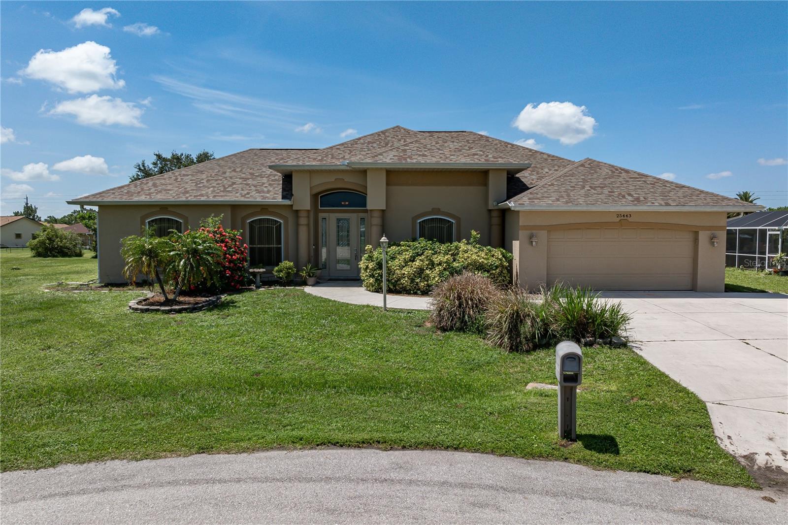 DEEP CREEK POOL HOME ON QUIET CUL-DE-SAC - This isn’t just another four-bedroom pool home. This 4 bed/2 bath + office home delivers a floor plan that actually works. Architectural details include an open-concept layout w/spacious great room, tile flooring throughout the main living areas, high ceilings including a double tray in the great room, and a chef-inspired kitchen. Sliding glass doors in several rooms open to the lanai extending the living space outside. The kitchen is the heart of the home w/raised panel cabinetry, granite counters, a closet pantry and stainless steel appliances offer timeless style, while the breakfast bar connects seamlessly to the great room and dining area. The home office features a built-in desk w/ample storage. The split-bedroom floor plan gives everyone space & privacy. The oversized master suite boasts two walk-in closets & an en-suite master bath that connects directly to the laundry room. The master bathroom has dual sinks, a garden bath & tiled shower. The guest bedrooms share a guest bath that doubles as the pool bath w/access to the lanai. Outside, the lanai features a large covered area & an in-ground pool. Relax in the shade or kick back in the pool - either way, this is the kind of backyard that makes you want to stay home more often. Other amenities include whole-house hurricane protection, 2023 ROOF, an attached two-car garage w/EV charger, & generator hook-up. Home is located on a quiet street in the growing, deed-restricted neighborhood of Deep Creek. Enjoy quick & easy access to Punta Gorda, Port Charlotte & North Port via Kings Hwy, Veterans Blvd or I-75. Deep Creek has miles of sidewalks, a community park w/playground, tennis & basketball courts as well as a semi-private golf course. Take advantage of all the area has to offer from your new home base. Make an appointment today.