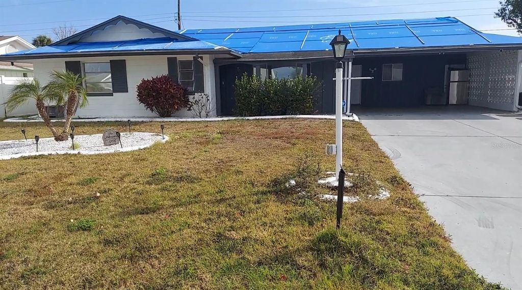 Photo of 1205 Hacienda Drive, Sun City Center, FL 33573 (MLS # O6376213)