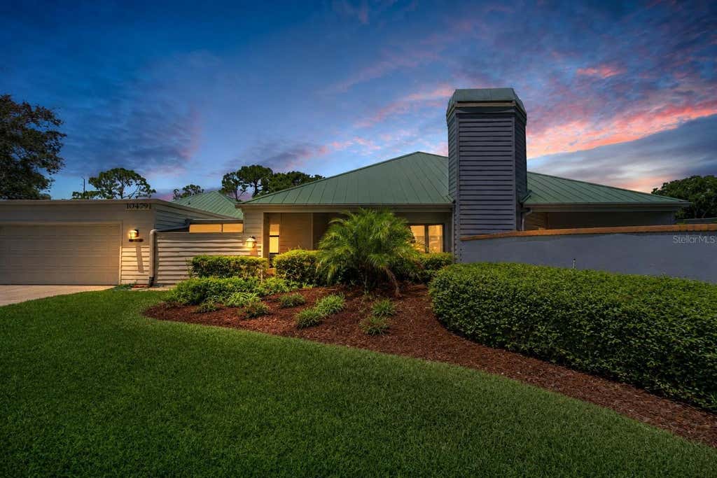 Photo of 10479 Longwood Drive, Seminole, FL 33777 (MLS # TB8408424)
