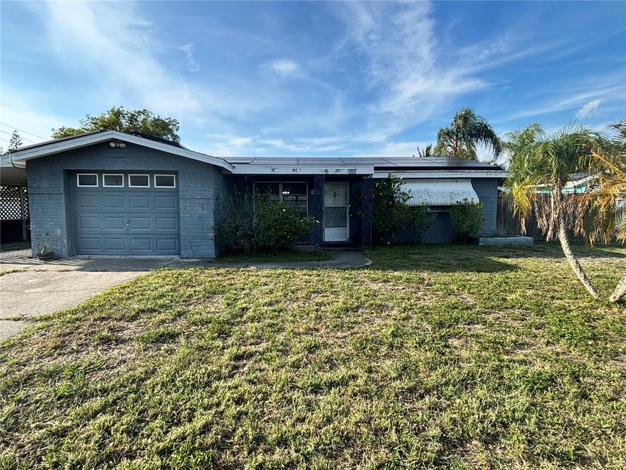 Welcome to this beautifully maintained concrete block stucco home offering 3 bedrooms, 2 bathrooms, and an inviting open floor plan designed for comfortable everyday living and entertaining! From the moment you step inside, you’ll appreciate the spacious layout and durable 18” ceramic tile flooring flowing throughout the entire home for easy maintenance and a clean modern feel.
The kitchen features real wood white shaker cabinets, white appliances, a double stainless steel sink, and a custom tiled backsplash that adds the perfect touch of style and character. Ceiling fans throughout the home help keep things comfortable year-round.
One of the standout features of this property is the incredible energy-saving package that comes fully included in the purchase price! The home is equipped with a fully paid 5-year-old solar system along with two Tesla Powerwall backup battery packs, providing efficiency, energy savings, and peace of mind for the new owner. The electrical panel was also updated just 5 years ago to support the system.
Step outside and enjoy the large screened rear patio complete with its own dedicated A/C unit, creating the perfect space to relax or entertain regardless of the season. The fenced backyard offers privacy and functionality while the two separate tool sheds provide plenty of additional storage space for tools, hobbies, or outdoor equipment.
Additional updates include a 4-year-old HVAC system, 8-year-old roof, and 8-year-old hot water heater. The property also features a 1-car garage and an additional covered 1-car carport for extra parking convenience.
Conveniently located close to fantastic restaurants, shopping, and everyday amenities, this move-in ready home combines comfort, efficiency, and value all in one incredible package. Schedule your private showing today before this one is gone!