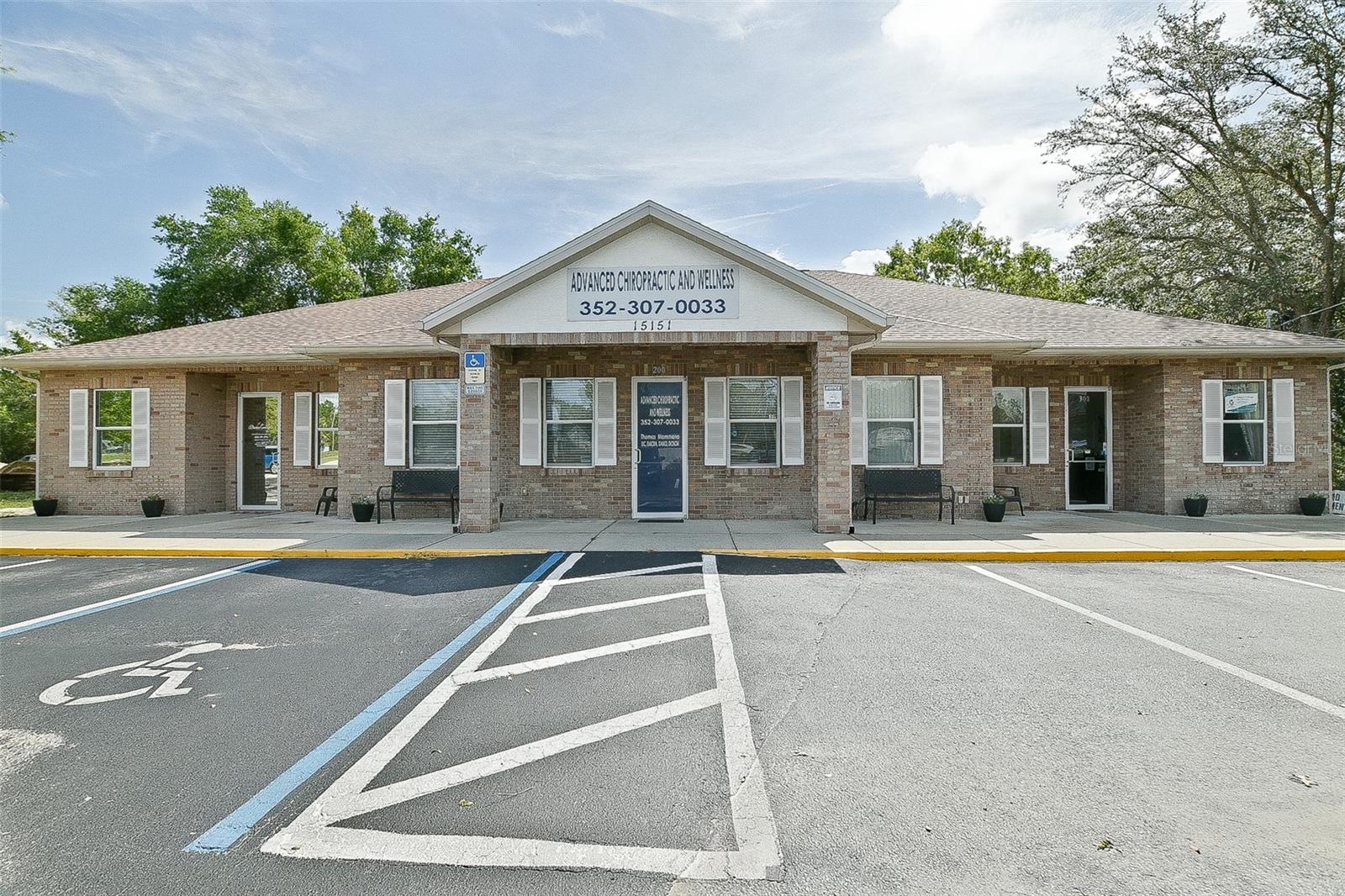 Prime location, minutes to The Villages, directly off busy, high traffic hwy 441 with great exposure. Meticulously maintained building by owner. Three offices currently leased by professionals a chiropractor, a therapist and a doctor with yearly leases. Updated HVAC and roof, on well and septic. Marquee sign at road currently says Wellness Center.