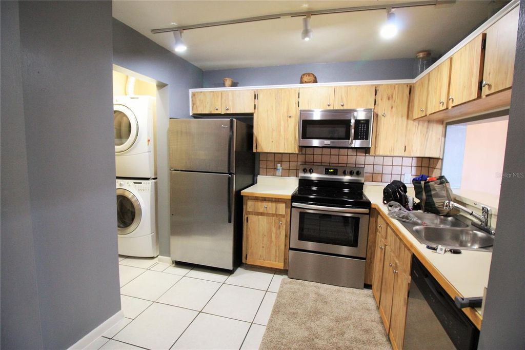 Photo of 5208 Via Hacienda Circle #A201, Orlando, FL 32839 (MLS # R4910862)