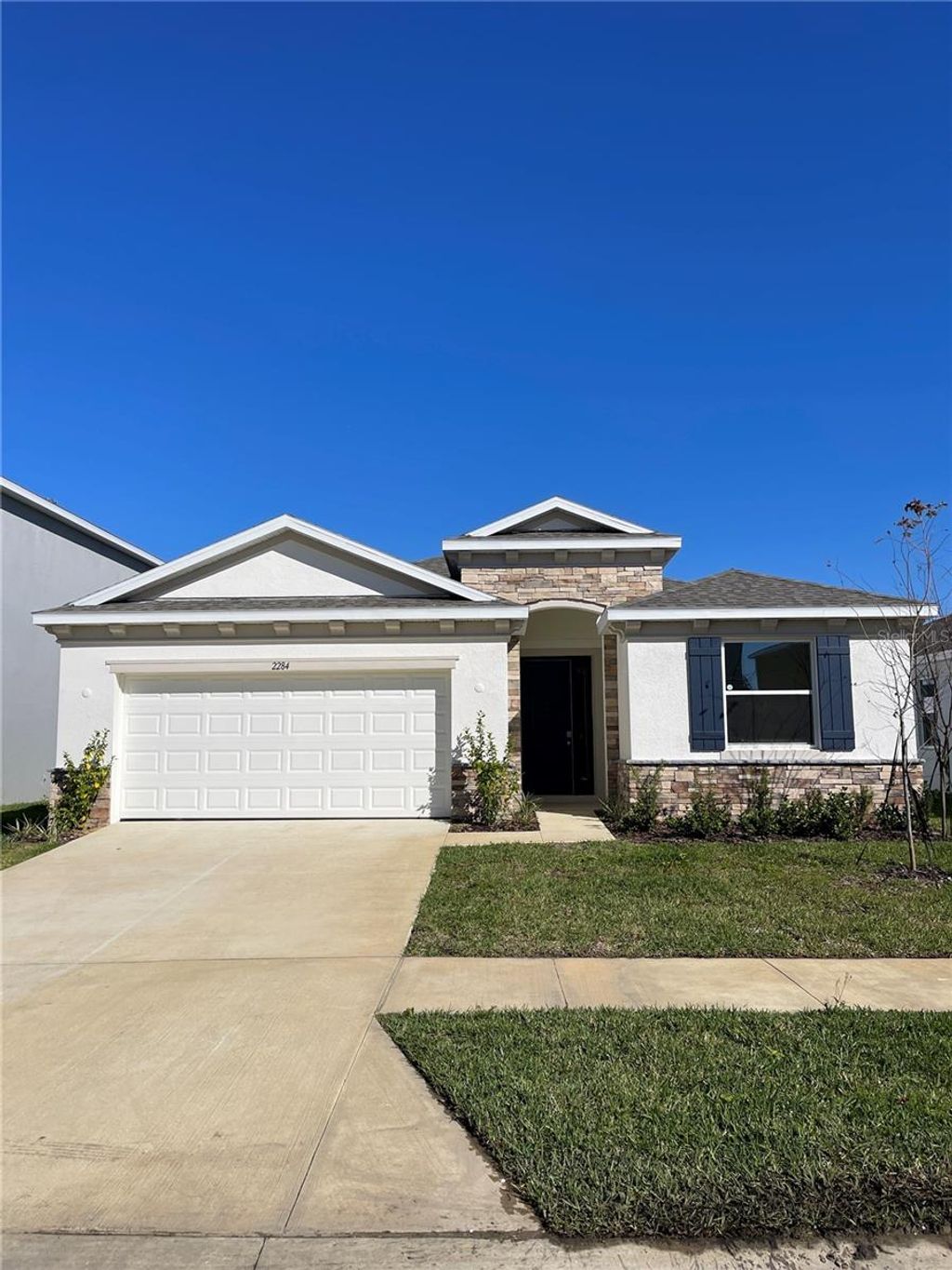 Photo of 2284 Rikkola Lane, Wesley Chapel, FL 33543 (MLS # TB8459900)