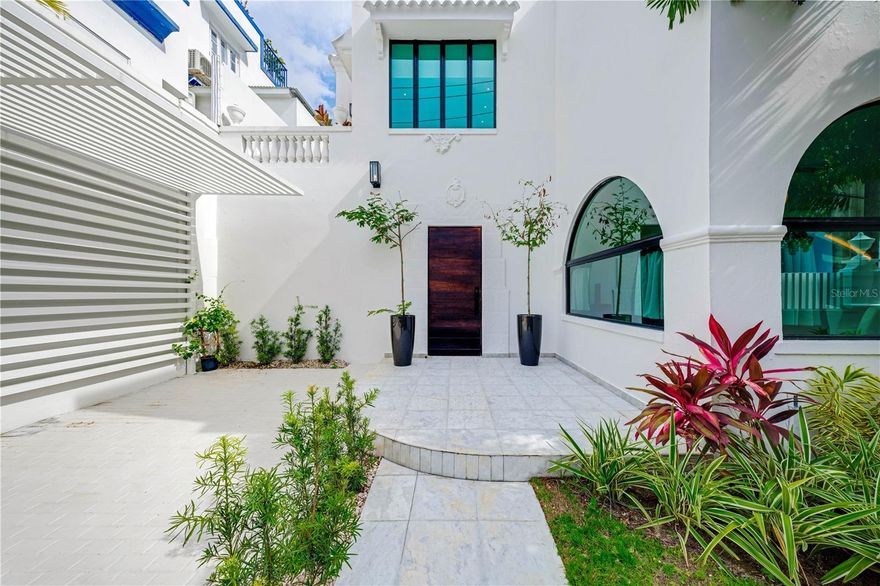 ***SOLD*** Explore an unrivaled metropolitan lifestyle within a tropical sanctuary in Condado Beach. This triple-mint, newly renovated and designed residence combines city and island living harmoniously to create the ultimate retreat. Built circa 1920 and reconfigured in 2023, this spectacular home showcases Spanish Revival architecture, which includes original murals and detailed ornaments. An effortlessly timeless design curated by Maison Lorence accents the one of a kind residence with light-filled spaces and a captivating atmosphere. The two-level main home’s first floor encompasses all entertainment spaces, including beautifully appointed dining room, powder room and designer kitchen with pantry and outdoor breakfast space. The second floor is comprised of 3 bedrooms, 3 bathrooms and flex/office space. The primary suite features a 9’ x 8’11’’ walk-in closet, in addition to a private bath with dual vanities, double shower and standalone tub. One of the two guest bedrooms is also ensuite and the other offers exclusive access to an East-facing balcony. The lush patio with blooming greenery is perfect for al fresco dining/entertaining, boasting a 8’ x 30’ lap pool and wet bar that lead to an accommodating guest casita with an additional bedroom and bathroom. A dedicated laundry room, 2 gated parking spaces, one of which is indoor covered, and a variety of storage options add to the home’s unmatched appeal, as well as a full-power generator and water cistern. Located on one of the best residential streets in CoBe, aka Condado Beach, the island’s cosmopolitan epicenter. 1216 Luchetti is a rare to market offering that enjoys a prime location near boutiques, entertainment hotspots, bustling nightlife, and superb dining options. Additionally, it's also conveniently located near prestigious schools and pristine beaches that provide the ideal setting for practicing aquatic sports such as kayaking, jet-skiing and more. Immerse yourself in an unparalleled Caribbean lifestyle surrounded by an abundance of amenities.
