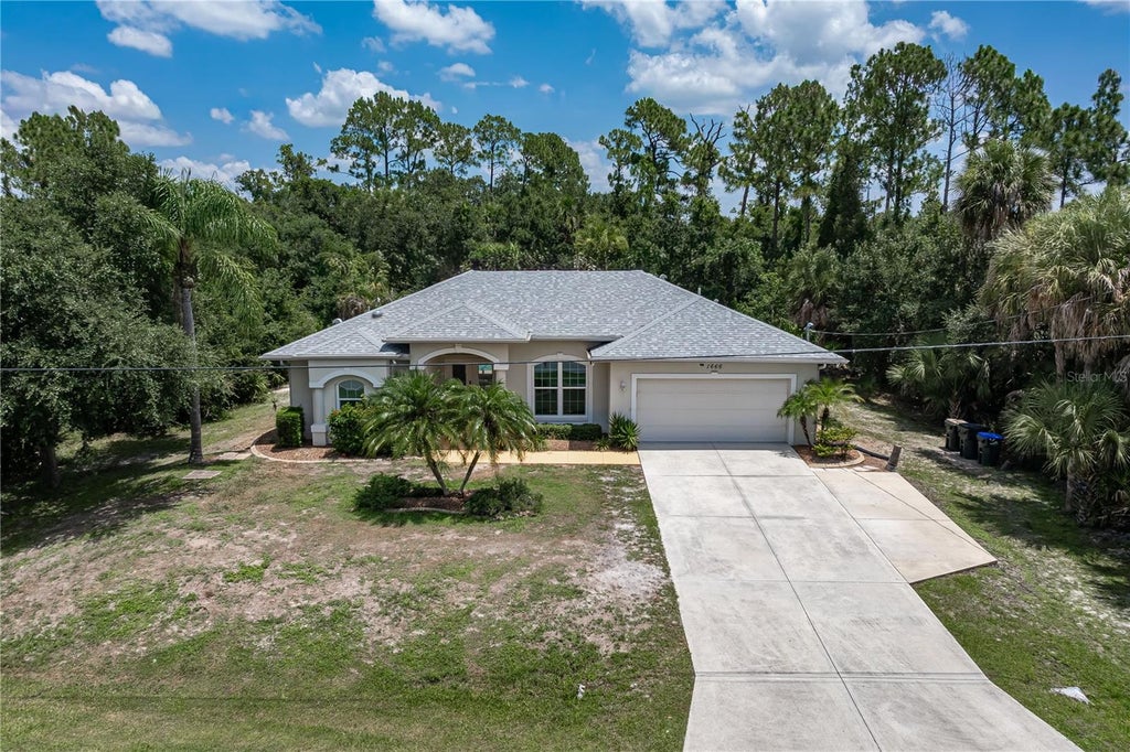 Photo of 1666 Purple Lane, North Port, FL 34286 (MLS # C7528841)