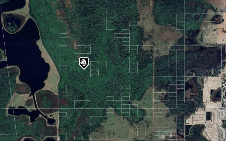 Rare opportunity to acquire 10 acres of unimproved land with long-term potential. This parcel is currently landlocked and will require due diligence regarding access, zoning, and permitted uses. Ideal for buyers seeking land investment opportunities. Property sold As-Is.