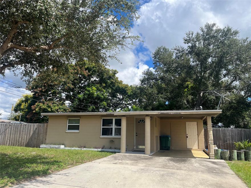 Charming 2 bedroom 1 bath home in Largo. Living Dining combo with an open kitchen and tile floors.  Nice sunroom that can be used as an office or family room. The cozy kitchen on the right wall has newer appliances and is open to the living room. To the left of the entrance are the two bedrooms - 11 x 10 and 8 x 8. The bathroom has been updated with both a tub and shower head. From the glass room you can have a total view of the backyard. The large fenced backyard has a cement pad for sunbathing or grilling, and a sidewalk to the access gate on the north side of the property which is bordered by 115th Avenue. This unique property is just off Seminole Blvd, a short distance south of the Largo Mall on Ulmerton Road. Measurements are approximate and should be verified.