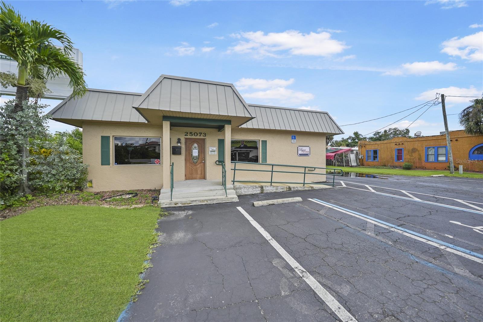This free-standing commercial building with highly sought-after Commercial General (CG) zoning is perfectly situated just minutes from downtown Punta Gorda. Featuring 2 enclosed offices, 2 reception areas, a spacious conference area, a break room, and a tech room, this property offers ample space for various business needs. The large, grandfathered signage ensures high visibility, making this location ideal for attracting foot traffic and brand recognition. Positioned directly across from the Peace River, the building enjoys serene surroundings while being close to the vibrant heart of Punta Gorda, known for its shopping, dining, and year-round events. With easy access to I-75 and plenty of parking, this property offers convenience and functionality for your business. Don't miss this exceptional opportunity!
