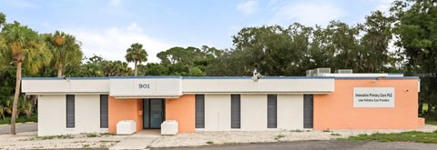 Photo of 901 N Grove Street, Eustis, FL 32726 (MLS # O6451203)