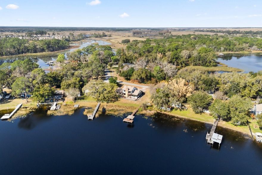 Rare opportunity to secure a premier lakefront homesite on Lake Hickory Nut, a 403-acre skiable and bass fishing lake in the heart of Winter Garden. Offering approximately 100 feet of direct waterfront with no HOA, this oversized lot presents the ideal canvas to build a custom lakefront estate. Positioned on a quiet, tucked-away street surrounded by established homes and mature landscaping, the property allows for ample space to design a luxury residence while accommodating boat or RV parking. Enjoy breathtaking sunrise views across the water along with direct sightlines for Disney fireworks, creating a truly unique Central Florida lifestyle. The lake is routinely tested by Orange County and recognized for its water quality, offering exceptional clarity for year-round boating, skiing, and fishing. A private dock is already in place, providing immediate lake access and a head start for future development. Conveniently located near Horizon West, Hamlin Town Center, Downtown Winter Garden, and Orange County National Golf Center, this is a rare chance to build new on one of the area’s most desirable skiable lakes with expansive water frontage and no HOA restrictions.
