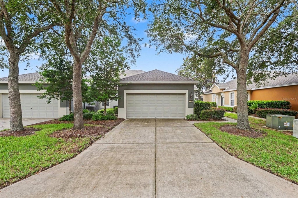 Photo of 13703 Crest Lake Drive, Hudson, FL 34669 (MLS # TB8530204)