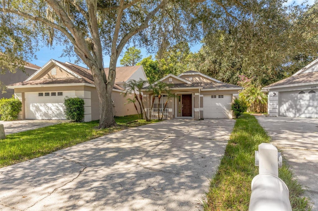 Photo of 6115 Sand Key Lane, Wesley Chapel, FL 33545 (MLS # TB8536004)
