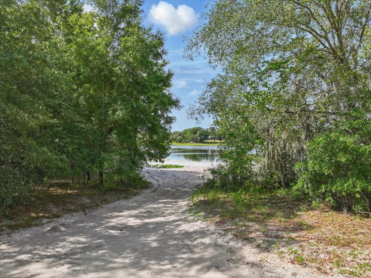 5+ ACRES LAKEFRONT FUTURE HOMESITE IN GILCHRIST COUNTY! Your ideal lifestyle awaits here at Dinner Pond! Living with beautiful waterfront views and 5.38 acres to build a home or place a manufactured home. Imagine enjoying the sunsets over the water, casting a line from your own large sandy bank, or just simply sprawling out on your acreage.. you can certainly enjoy the serenity of nature and country living here. With no HOA, it’s waiting on you to decide how to make this land your own! Conveniently located near 337, it’s easy to get to the city of Trenton, Newberry or Gainesville. Make this rare opportunity of owning acreage and being waterfront a reality for you!