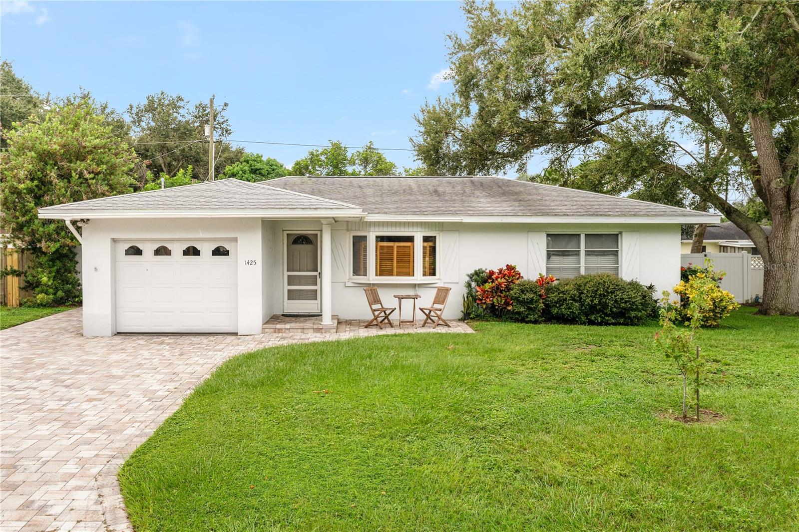 WOW! Look at this super cute, aesthetic and bright home! There is lots of light! Move right in, as this home is offered ALL FURNISHED! Over $36K in upgrades, including air quality cleaning system (2022), bathroom (2023), pavers (2022), newer appliances (2024) and many more! Hurricane impact front bay window. You will enjoy the spacious sun room which you can use for entertaining, office, or just relaxing looking out a huuuuge beautiful backyard! Widened driveway can fit 4 cars! Greatly expanded back patio and front bistro patio as part of the pavers! Just minutes from the world famous Clearwater Beach, a bike ride away to Eagle Lake Park, and grocery and other shops are just a couple of minutes drive away! HURRY! THIS ONE WON'T LAST!!!