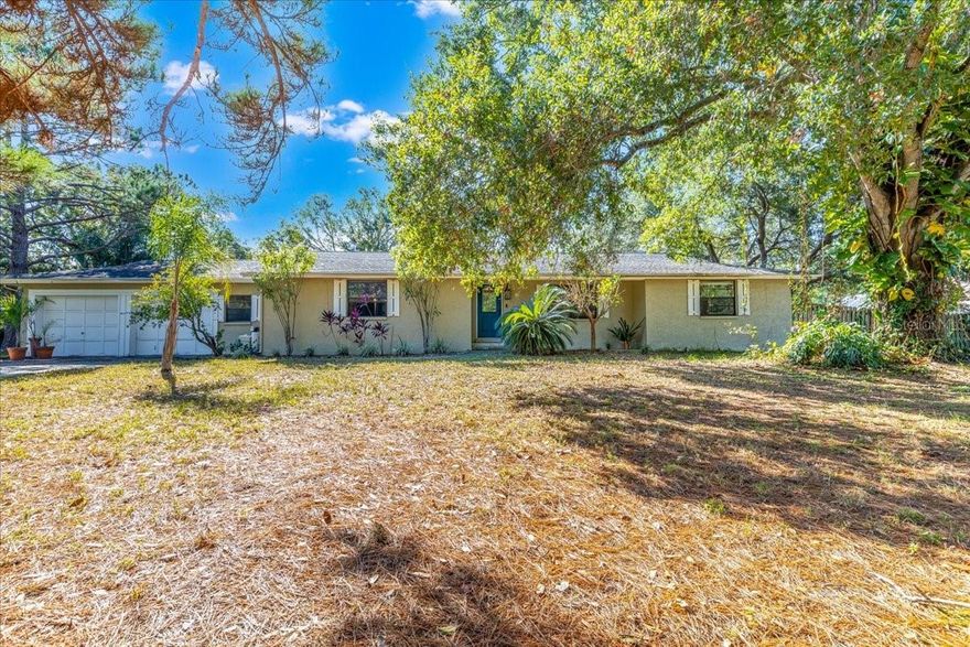 ** Multiple Offers received - seller asking for Highest & Best by 6.00pm on Friday 28th November, 2025 ** BRING YOUR HORSES, BOAT OR RV ! Welcome to Twin Branch Acres, one of Tampa Bay’s most desirable equestrian and golf-cart friendly communities. This rare opportunity sits on 1.07 fully fenced acres and offers a blend of space, privacy, and endless potential — all with no HOA and no CDD. Whether you’re looking to remodel, expand, or simply enjoy the freedom of country-style living close to the conveniences of the city, this property delivers exceptional possibilities. The home features a 3-bedroom, 2-bath split floor plan, designed for both comfort and functionality. The primary suite includes its own en suite bath, offering privacy from the secondary bedrooms located on the opposite side of the home. The main living areas provide an open and flexible layout ready for reimagining — ideal for those who want to put their personal touch on a home in a prime location. A spacious enclosed Florida room runs along the rear of the home, providing additional living or entertainment space and the perfect opportunity to create a sunroom, playroom, or hobby area overlooking the peaceful, tree-lined property. Between the home and the garage is a dedicated laundry/mudroom, offering convenient access for daily living, storage, or a future drop zone when coming in from the yard or barn. Outdoors, you’ll find the type of space that’s rarely available in West Tampa. The entire property is fully fenced, offering privacy and security for pets, horses, or other animals. The barn provides immediate utility for equestrian use, storage, or conversion to a workshop or studio — the possibilities are endless. There’s also plenty of open yard space for additional improvements such as a pool, garden, or expansion to the existing home.  Residents of Twin Branch Acres enjoy a one-of-a-kind lifestyle. The community is known for its equine-friendly environment, winding roads, and country charm — all while being just minutes from everything. Enjoy evening golf-cart rides, neighborhood gatherings, and scenic views, or saddle up for a ride right from your own property. Located off Race Track Road, this home offers easy access to shopping, dining, and entertainment in Westchase, Citrus Park, and Odessa, as well as quick connections to the Veterans Expressway, Tampa International Airport, and the Gulf beaches. Whether you’re searching for a renovation project, an equestrian retreat, or simply room to breathe, this property presents a rare opportunity to create the lifestyle you’ve been dreaming of. With its acreage, flexible floor plan, and unbeatable location in one of Tampa Bay’s most beloved acreage communities, this home in Twin Branch Acres offers the perfect foundation for your next chapter.