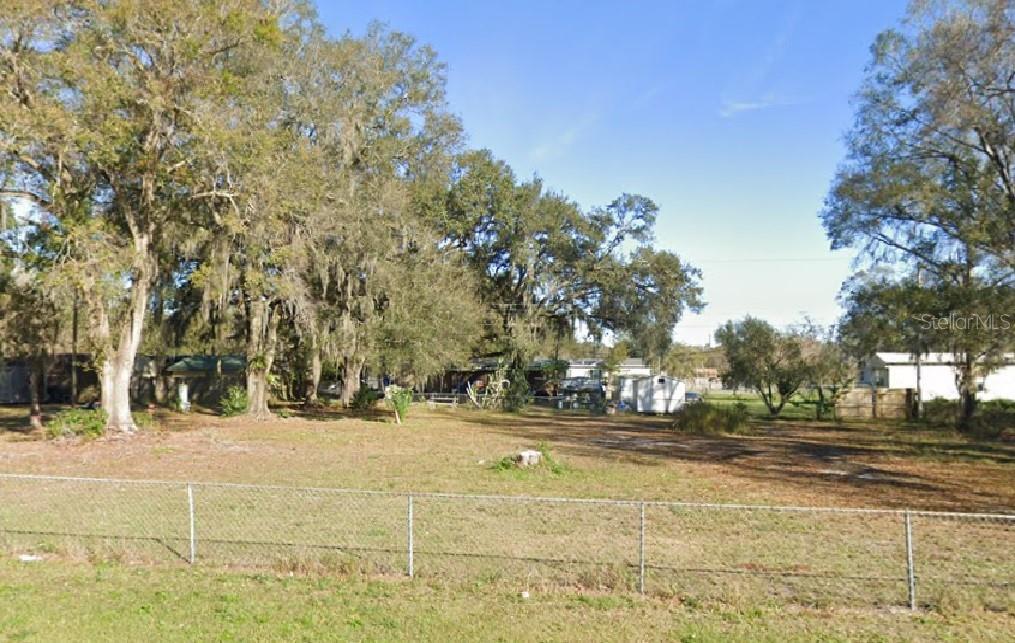This is an assignment of contract. This .86-acre double lot at 3316 and 3306 Oakland Drive in Lakeland offers a rare combination of freedom, convenience, and value. With electricity already available and a well in place, all that’s needed is a septic system to start building. Whether you’re planning a mobile home or a custom single-family residence, this property gives you room to create your vision—with space for a pool, detached garage, or outdoor living area. Located in an X flood zone, no flood insurance is required, and the absence of HOA fees means you can design your property without restrictive oversight.
Lakeland is perfectly positioned between Tampa and Orlando, making daily life both relaxed and connected. From this address, you’re roughly 40 minutes to Tampa and 50 minutes to Disney and the Orlando attractions, ideal for weekend getaways or an easy commute. Everyday necessities are just minutes away, with nearby grocery options such as Publix, Walmart, and ALDI. For families, Philip O’Brien Elementary, Crystal Lake Middle School, and Tenoroc High School serve the area, providing convenient access to education. Lakeland Regional Health Medical Center, Watson Clinic, and South Florida Baptist Hospital are all within a short drive, offering top-tier healthcare close to home.
Life in Lakeland blends small-town charm with big-city convenience. Known for its beautiful lakes, welcoming neighborhoods, and thriving local culture, it’s a community where you can enjoy fishing, festivals, and farmers’ markets while still being close to shopping, dining, and major highways. This double lot gives you the space to build exactly what you want in one of Central Florida’s most desirable locations.