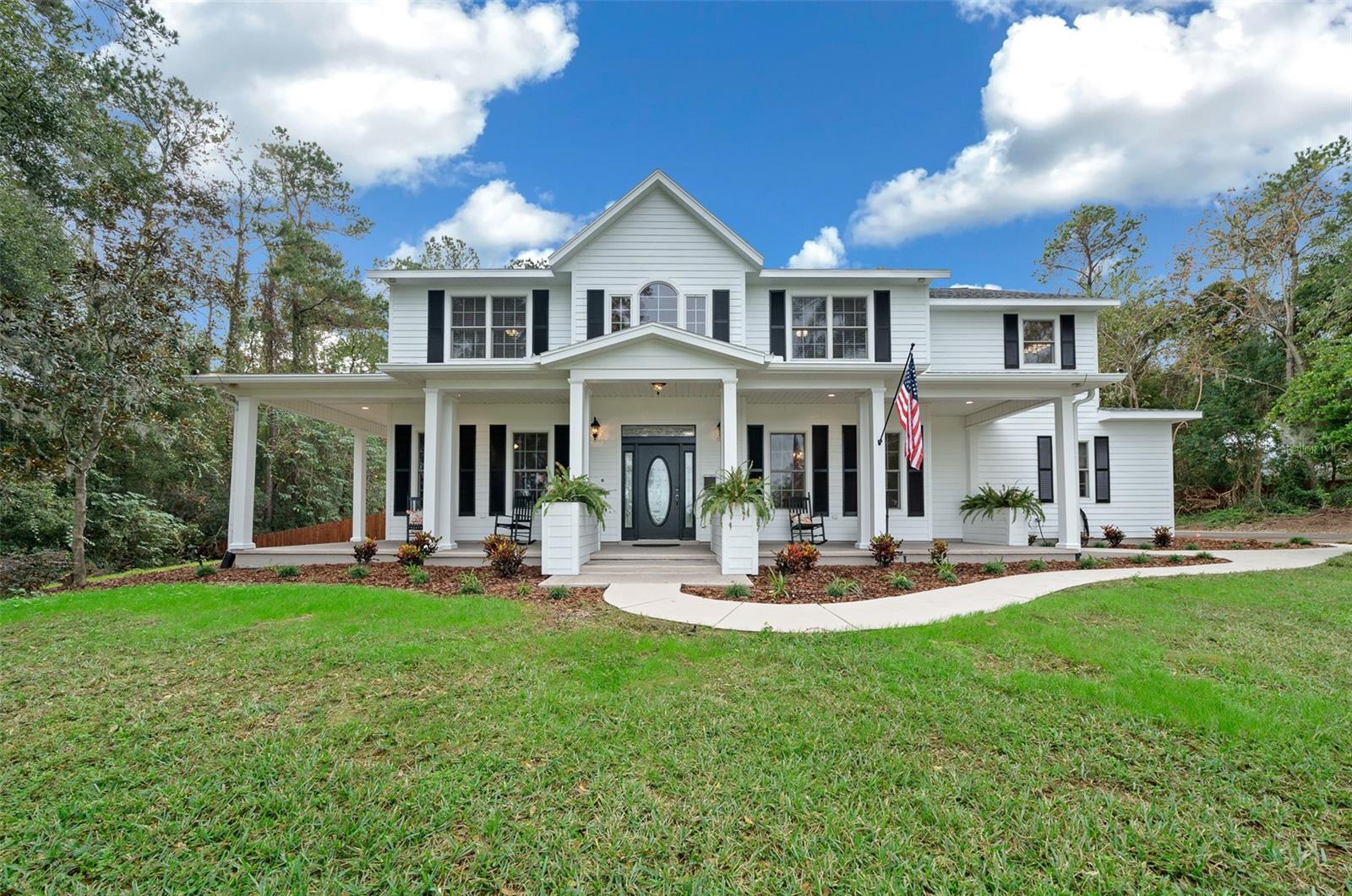 Exquisite 6.36-Acre Estate located in SE OCALA! Sits on the hilltop with AMAZING views. Priced $40,000 under recent Appraisal. Zoned A2 and ready for your horses!.
Located just 4 miles from downtown Ocala ,approximately 12 miles from the World Equestrian Center and 25 miles from The Villages! This stunning 6.36-acre estate offers the perfect blend of luxury, privacy, and convenience...all with no HOA.
Key Features:
5,513 sq. ft. of beautifully designed living space, 5 spacious bedrooms & 5 full bathrooms, Elegant two-story layout with soaring ceilings, grand chandelier, and stately spiral staircase, Screened heated pool & jacuzzi with expansive patio perfect for entertaining, Wraparound porch with breathtaking sunrise and sunset views,
Newly renovated kitchen featuring a large island, breakfast nook, formal dining room, and grand scullery/butler pantry, Main Primary Suite with sitting area, gas fireplace and elegantly designed En Suite Bath!
This Meticulously designed home also has second ensuite primary bedroom,
Office, bonus room, and dedicated wine room, 2 gas fireplaces, whole-house generator, and 3-car garage, 3-stall horse barn with paddock, fully gated and fenced,
Large cleared front area and wooded back acreage with potential for arena, guest house, or additional barn
Potential to divide into two parcels (inquire for details)
This is a rare opportunity to enjoy the peace of country living without sacrificing the amenities of city life. With luxurious touches throughout and extensive outdoor space, this estate is ideal for equestrian enthusiasts, entertainers, or anyone seeking a private retreat.
Schedule your private showing today!