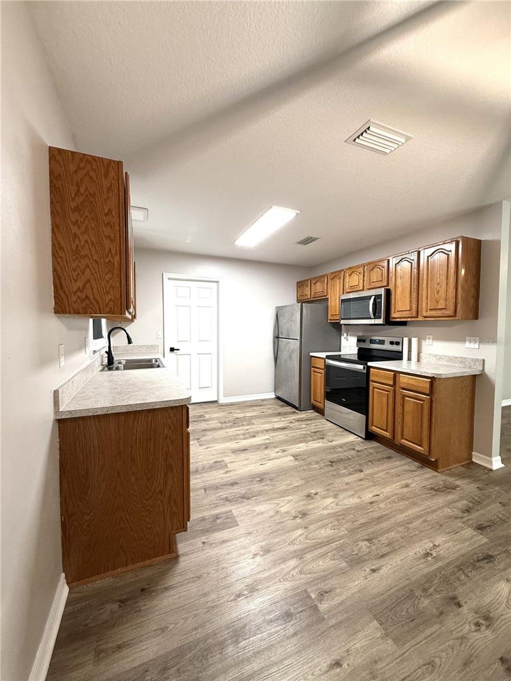 Photo of 653 SE 13th Avenue, Okeechobee, FL 34974 (MLS # OK225679)