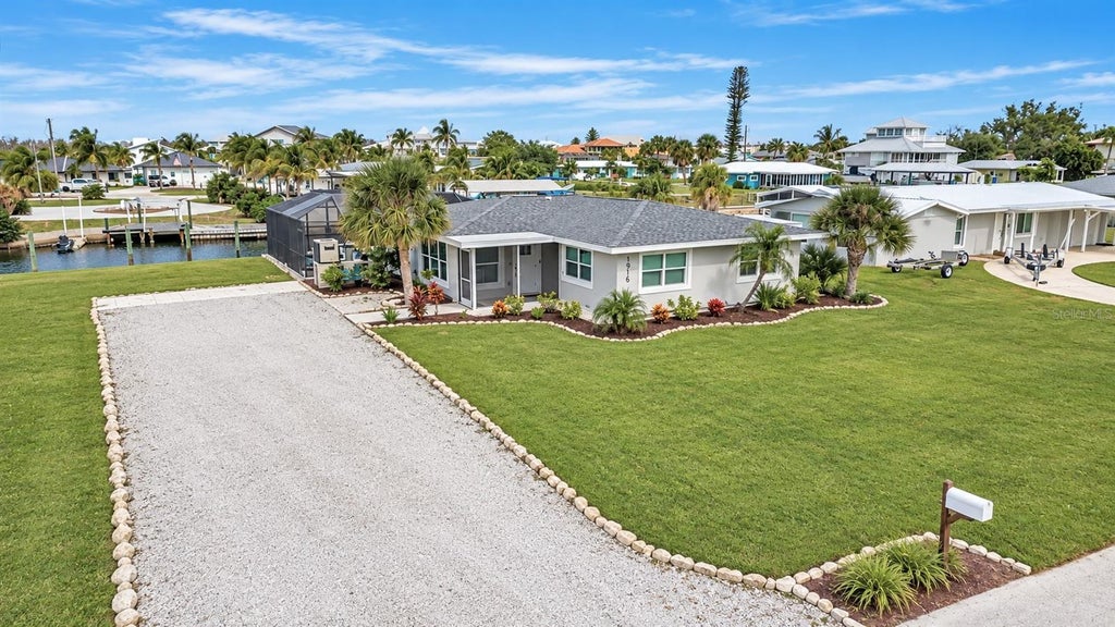 Photo of 1916 Michigan Avenue, Englewood, FL 34224 (MLS # C7532516)