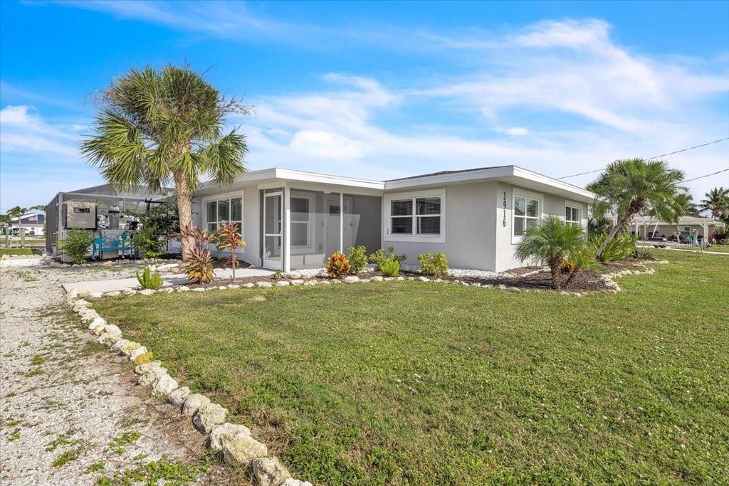 Photo of 1916 Michigan Avenue, Englewood, FL 34224 (MLS # C7532516)