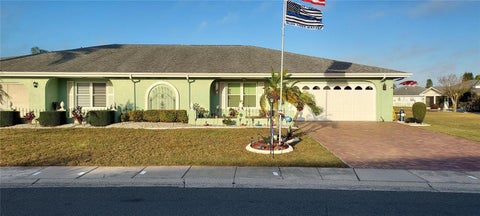 Photo of 906 Bluewater Drive, Sun City Center, FL 33573 (MLS # O6449639)
