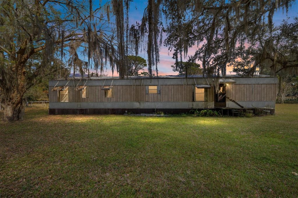 Photo of 17053 NE 148th Terrace, Fort Mccoy, FL 32134 (MLS # G5104794)