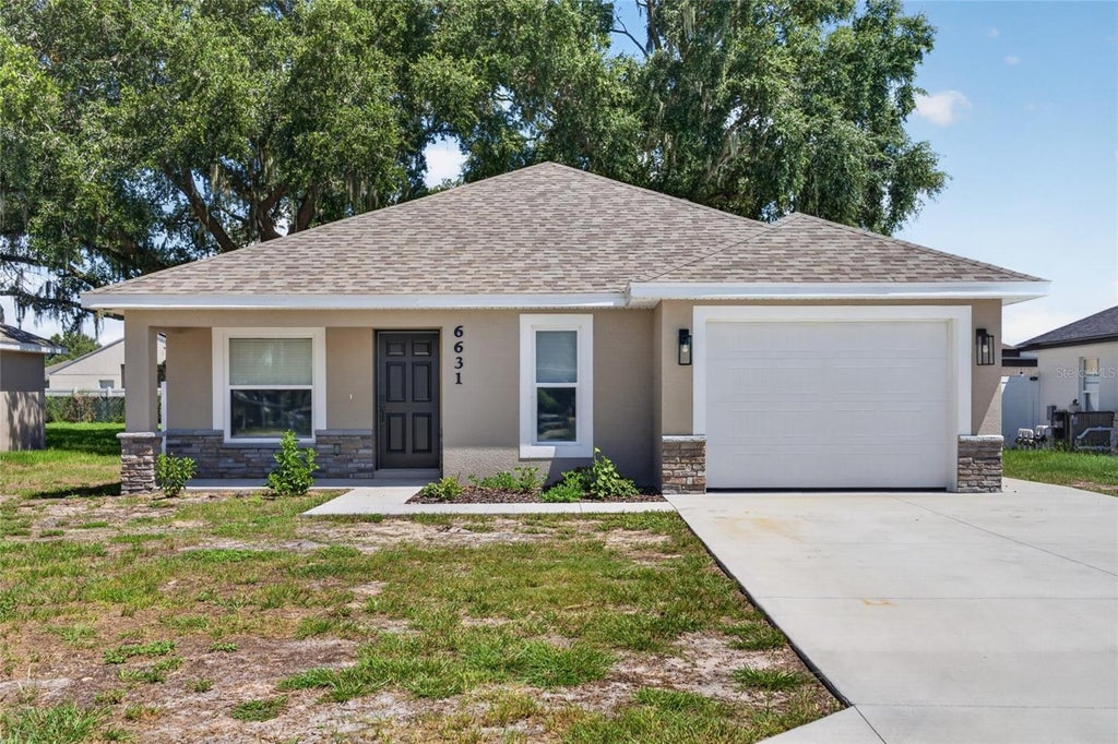 Photo of 6631 Thornhill Road, Winter Haven, FL 33880 (MLS # L4964270)