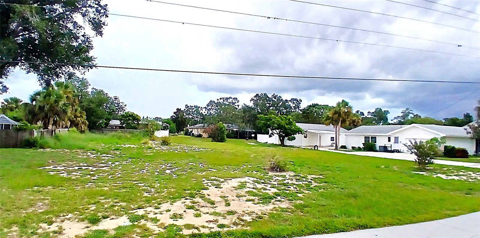 **Price Reduction** Build your dream home on this beautiful vacant lot located across the street from picturesque Lake Wales! Enjoy serene lake views, peaceful surroundings, and the charm of a well-established neighborhood. With plenty of space for a custom-built home, this lot offers the perfect opportunity to create your own private retreat while still being close to downtown, shopping, schools, and parks. Don’t miss the chance to bring your vision to life in this desirable location.