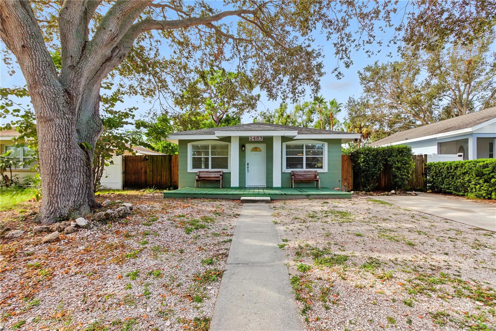 WELCOME HOME!! Located just outside of downtown Bradenton on a quiet street, this 3 bedroom home is ready for you to move right in! Stepping through the front door, you are welcomed into the bright and updated living room, complete with wainscoting. Continuing through to the eat in kitchen, you’ll find updated appliances and finishes that can easily fit any décor style. The windows in the kitchen allow for loads of natural light to filter in. Just off the kitchen in your laundry room, complete with washer and dryer. Down the hallway you’ll find 3 roomy bedrooms with a beautifully updated and stylish bathroom. There is a very spacious screened porch out back, great for entertaining or just enjoying a morning cup of coffee before you start your day. The large treed backyard provides tons of shade for your outdoor activities and there is rear street access to the yard. There is also a wood deck at the side of the home, great for barbecues or family gatherings. Lots of updates have been made to this adorable home, showing true pride of ownership! Call for your personal viewing today!