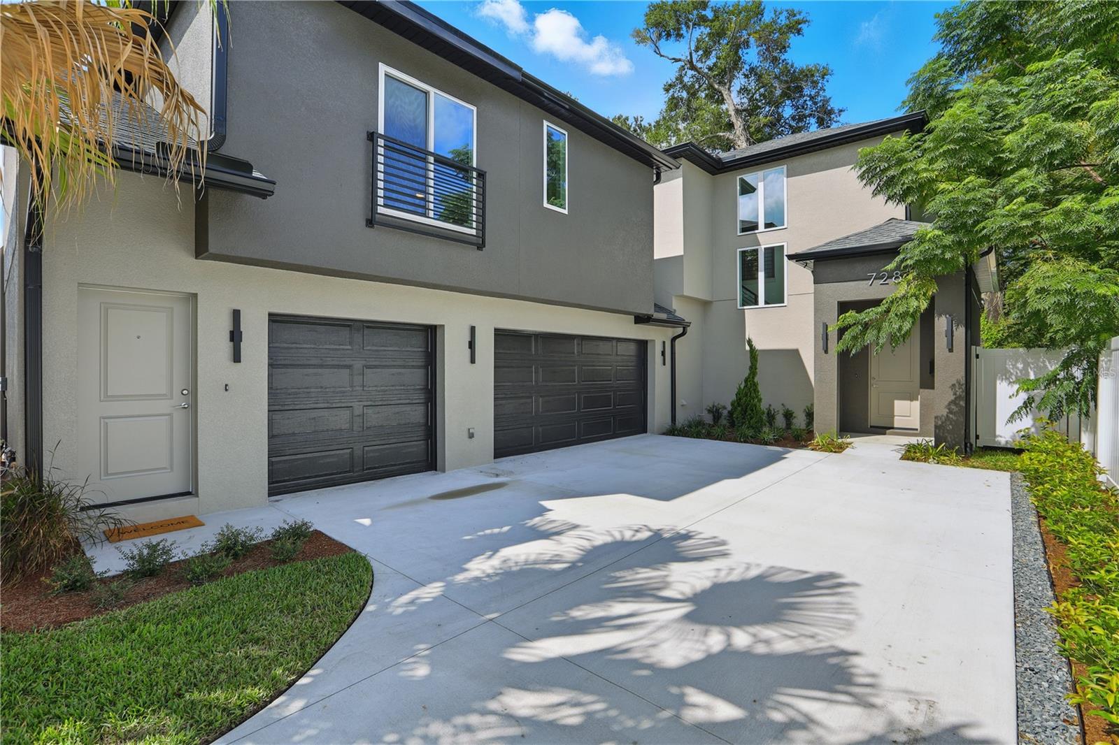 Opportunities like this don’t come along often. Located in Orlando’s College Park community, where brand new construction typically exceeds $1+ million, this home offers the luxury of new build living at a rare and attainable price point. The main residence features 3 bedrooms, 2.5 baths, and a 2-car garage, thoughtfully designed with open living spaces, abundant natural light, and sleek finishes including stainless steel appliances. Step outside to a fenced backyard, perfect for pets, entertaining, or evenings under the oak-lined skies of this historic neighborhood. But what truly sets this home apart is its attached private suite. With its own entrance, living area, full bath, and garage, plus pre-plumbing and wiring for a kitchenette, this flexible space opens the door to endless possibilities. Whether you envision it as an in-law suite, guest apartment, home office, or rental income unit, it transforms this property into a 4 bedroom, 3.5 bathroom, 3-car garage home with 2,300+ sqft of living space. Beyond the home, you’re buying into a lifestyle. Stroll the brick-lined streets of College Park, grab a latte at a neighborhood café, or bike to the Packing District and YMCA. In minutes, you can be in Downtown Orlando, Winter Park, Advent Health Village, or on I-4 for an easy commute. With no HOA restrictions, you have the freedom to enjoy this home your way.
This is more than a house, it’s a chance to live in one of Central Florida’s most desirable neighborhoods, blending modern construction, timeless charm, and unmatched versatility.