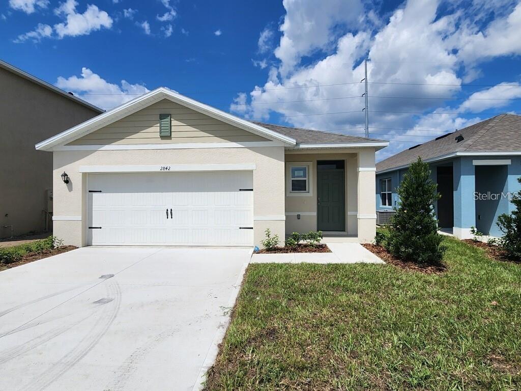 Welcome to Lake Deer Estates, located in the vibrant city of Poinciana. Ideally situated near world-class attractions, Lake Deer Estates offers a beautiful Florida lifestyle with resort-style amenities including a community pool, tot lot, and dog park—making it the perfect place to call home. Let us introduce you to the Harper floor plan, a thoughtfully designed single-story home featuring 4 bedrooms, 2 bathrooms, and 1,665 square feet of living space. Built with durable block-to-block construction, this home offers both style and functionality.
Interior highlights include 18x18 ceramic tile flooring and granite countertops in all wet areas, complemented by Whirlpool® stainless steel appliances. The open-concept layout seamlessly connects the kitchen, dining, and living areas, creating an ideal space for entertaining family and friends.
Enjoy the Florida lifestyle outdoors with a covered lanai, perfect for relaxing or hosting a weekend BBQ.
Additionally, this home comes equipped with our Home Smart System, adding enhanced convenience and security to your everyday living.