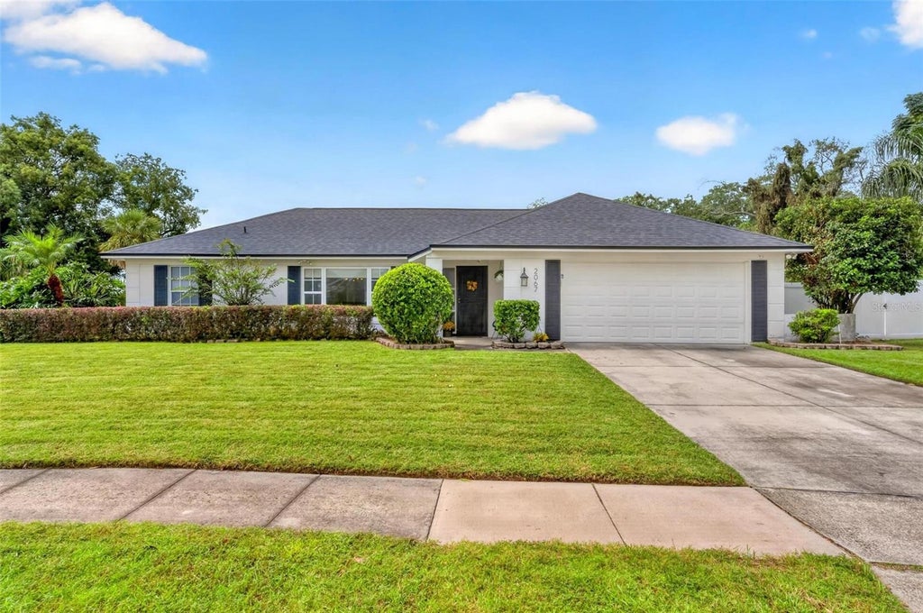 Photo of 2067 Poinciana Road, Winter Park, FL 32792 (MLS # O6446898)