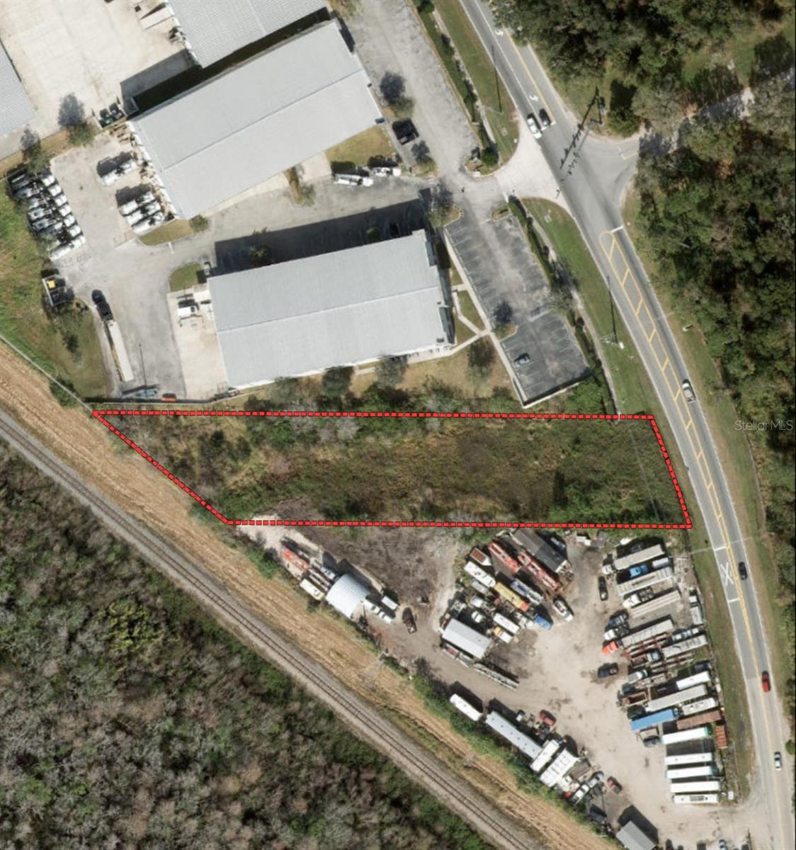 Industrial lot for sale located at Boggy Creek Road, Orlando, FL 32824, offering approximately 1.08 acres of land zoned Industrial General (I-G). This site features direct frontage on Boggy Creek Road, providing quick and convenient access to major highways and Orlando International Airport, making it ideal for warehouse, light manufacturing, or service facility development. Utilities including electricity, public water, and sewer are available, and engineered development plans are already in place. This property is situated in the growing Meadow Woods industrial corridor, surrounded by infrastructure and commercial growth.