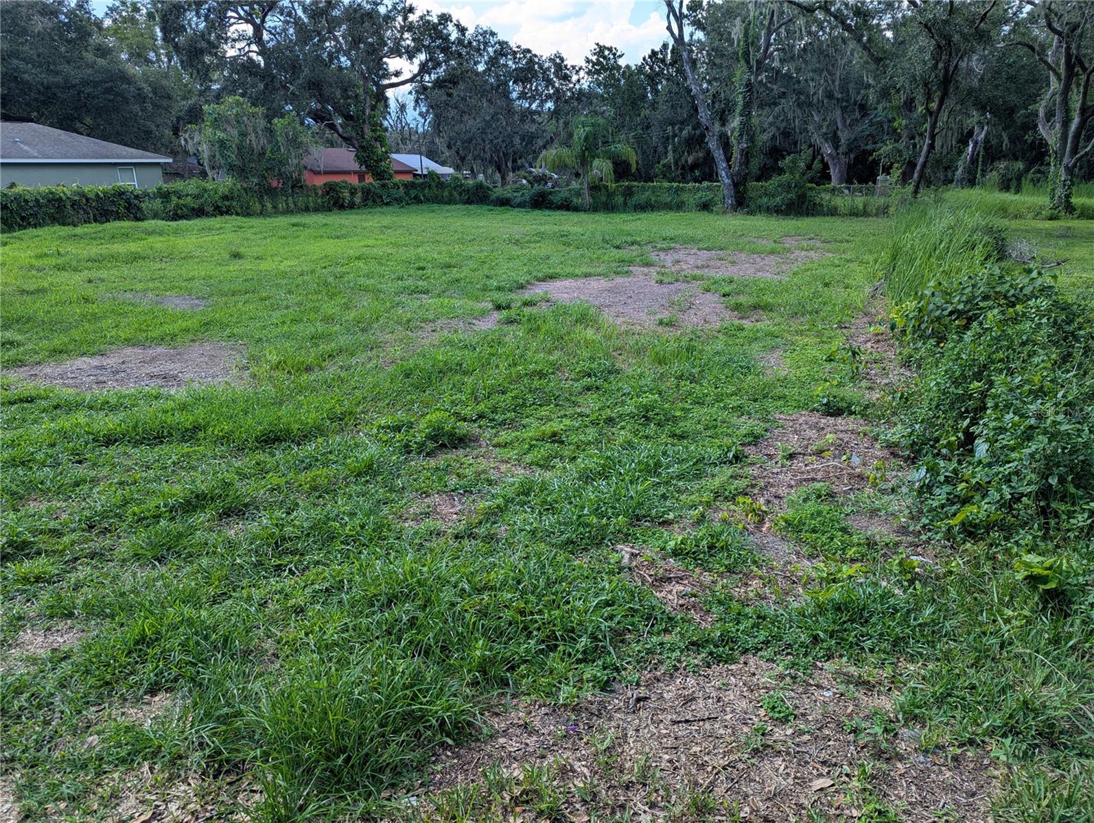 Another great opportunity awaits you to build your Dream Home, or setup your Manufactured Home, or build your Tiny Home on this cleared high and dry Single Family Lot with no HOA. And there is another vacant Lot side-by-side that is also cleared and on a quite paved street in the Bradley Junction Community. Come enjoy the small town feel that’s just a short drive to city amenities. The Lot is walking distance to the community playground and park. Water and electrical power lines are available. This lot is located in a great area of Mulberry/Bradley Junction with convenient access to major roadways. Don't miss out on the opportunity to own this Beautiful Lot. Call today and go directly.