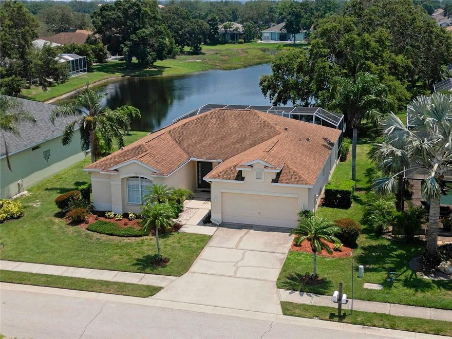 Welcome to River Pointe, a quiet, tree-lined boating community where your updated, furnished pool home awaits. Enjoy sunny Florida living with beautiful lake views and saltwater boat launch access, all from your own private slice of paradise.
This well-designed home features three bedrooms, two bathrooms, a two-car garage, and a screened-in private pool. The popular split-bedroom floor plan offers stunning lake views from all main living areas, with the primary suite separated from the two guest bedrooms that share a second bath.
Relax on the spacious covered and screened lanai or unwind in the pool while enjoying peaceful water views and watching an abundance of local birdlife.
Recent updates include:
Roof (2016)
Air Conditioning System (2018)
Updated kitchen and both bathrooms
Pool resurfaced with StoneScapes aggregate (2013), new waterline tile, and a charming mosaic dolphin feature
River Pointe offers a private community boat dock and ramp, located just up the street, providing direct access to the Manatee River with no lifts or low bridges—perfect for boaters and PWC enthusiasts heading straight to the Gulf of Mexico.
Enjoy low HOA fees and NO CDD fees, plus an unbeatable location near I-75 and I-275, offering easy access to St. Petersburg, Tampa, Sarasota, and major airports. You’re minutes from UTC Mall, fine dining, world-class shopping, and some of the best beaches in the world. Anna Maria Island is straight down SR-64, and Siesta Key is just five exits south.
This is the Florida Gulf Coast lifestyle you’ve been waiting for—welcome home!