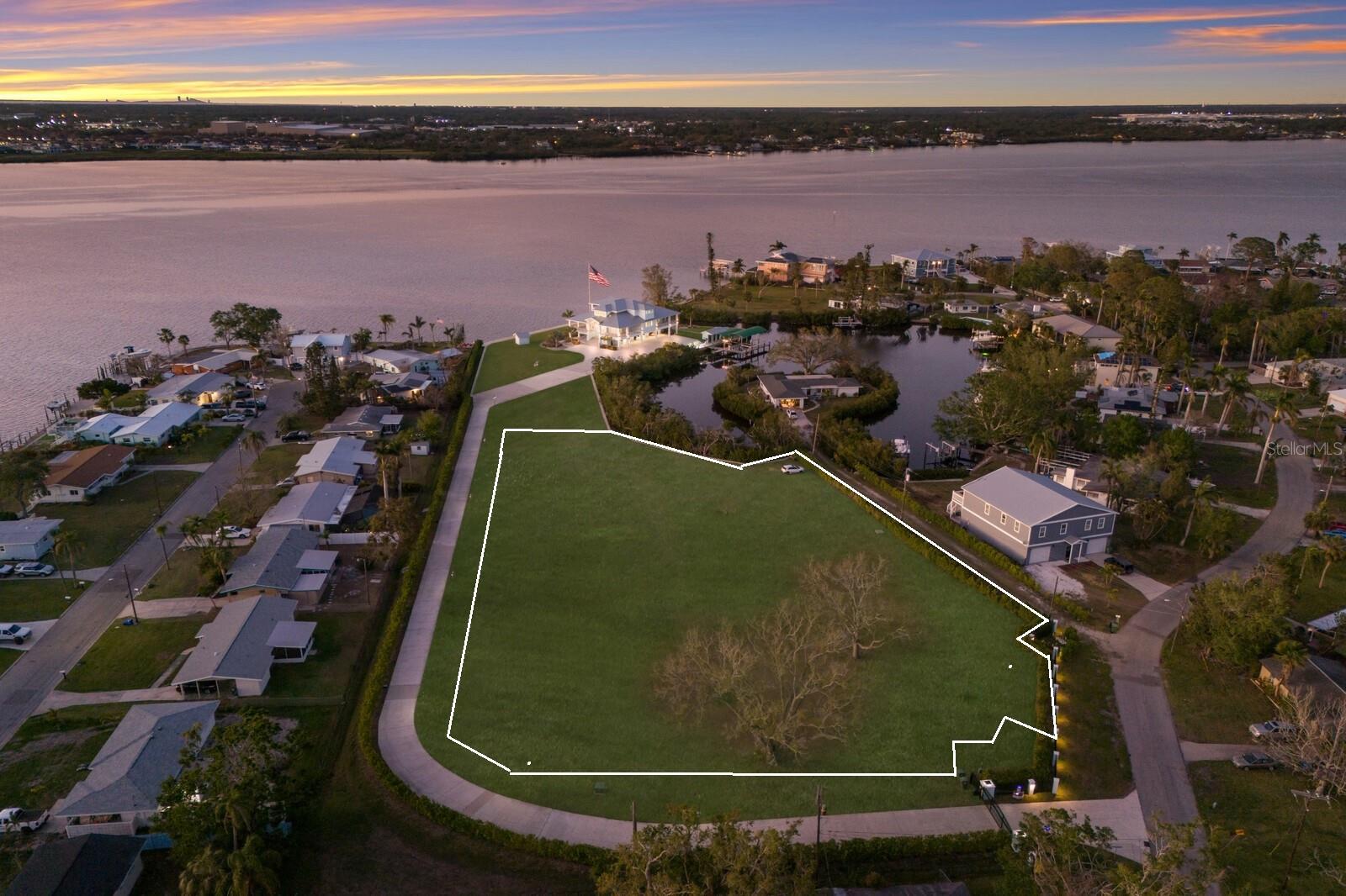 INCREDIBLE OPPORTUNITY TO PURCHASE A 1.75 ACRE WATERFRONT LOT WITH DIRECT ACCESS TO THE MANATEE RIVER, TAMPA BAY AND THE GULF! Why buy a tired, older waterfront home when you can purchase this private estate lot and build your dream home. Start living the Florida lifestyle you have dreamed about! Everything is ready with easy access to public utilities. A boaters dream - located on a protected lagoon directly off the Manatee River. Easy access to Tampa bay and only 10 miles to the Gulf! Conveniently located just minutes from downtown Bradenton, this property is near top-tier schools, including IMG ACADEMY, ST STEPHENS AND BRADENTON CHRISTIAN SCHOOL! Only minutes to the Gulf Beaches of Anna Maria Island, short distance to downtown St. Pete and the cultural & culinary arts of Sarasota. DO NOT WAIT ON THIS AMAZING PARCEL!