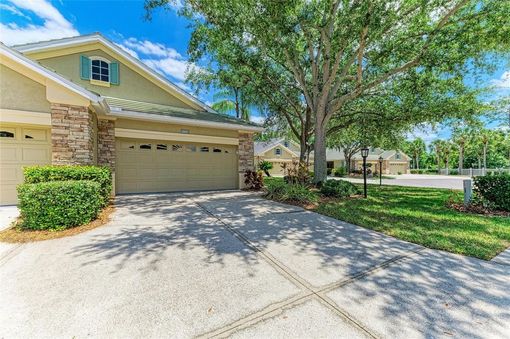 Photo of 5047 Lakescene Place, Sarasota, FL 34243 (MLS # A4691936)