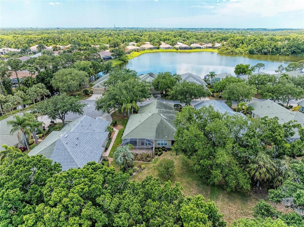 Photo of 5047 Lakescene Place, Sarasota, FL 34243 (MLS # A4691936)