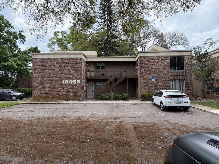 This fully remodeled 1-bedroom, 1-bath condominium presents an exceptional opportunity for first-time investors, seasonal residents, or buyers seeking a stylish and move-in-ready retreat in the desirable Tampa Bay area.

The residence showcases a beautifully redesigned kitchen featuring modern cabinetry, quartz countertops, and brand-new stainless steel appliances. A convenient pass-through to the dining area enhances both functionality and flow, creating an ideal space for entertaining and everyday living. The open-concept living and dining area offers generous space and comfort, complemented by premium luxury vinyl flooring throughout the main living areas.

Recent upgrades elevate the home’s appeal and value, including elegant chandelier lighting, oversized 70-inch ceiling fans, updated designer door hardware, and a fully installed alarm system for added security and peace of mind. The property is being offered fully furnished, allowing for immediate occupancy or turnkey rental potential.

Enjoy outdoor relaxation on the private screened-in back patio, perfect for morning coffee, evening unwinding, or hosting guests in a comfortable indoor-outdoor setting. The spacious bedroom features a large closet, while the unit also includes the convenience of a brand-new in-unit washer and dryer, eliminating the need to use community facilities.

Additional highlights include a brand-new AC system and water softener, contributing to long-term efficiency and comfort. The reserved parking space is located just steps from the front door, with ample guest parking available throughout the community.

Maintenance-free living includes water, sewer, trash service, and access to a beautiful community pool and amenities. The property is centrally located with convenient access to major highways, the Veterans Expressway, shopping centers, restaurants, grocery stores, and daily conveniences.

As an added incentive, the HOA fees are prepaid for the year with the accepted asking price, offering immediate financial value to the next owner.

This is a rare opportunity to acquire a fully upgraded, furnished, turnkey residence in a highly convenient Tampa Bay location.