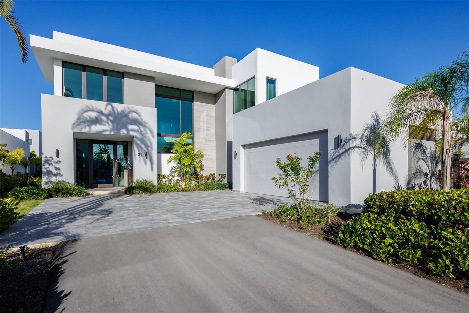 Welcome to The Isles 29, a masterfully remodeled residence by the distinguished interior design firm PiliandCo at Dorado.
Located within the exclusive Plantation Village community at Dorado Beach, this luxurious home offers access to world-class resort-style amenities — including two championship golf courses, private beach access, the renowned Watermill water park, tennis and pickleball courts, a fitness and wellness center, spa services, and award-winning dining experiences.
Spanning approximately 3,500 square feet, the residence features dramatic 25-foot double-height ceilings, creating an expansive and light-filled atmosphere. Designed for seamless indoor-outdoor living, the layout flows effortlessly between elegant interiors and lush outdoor spaces.
The home offers four bedrooms, each with spacious walk-in closets. The fourth bedroom is currently configured as a private office, with a full ensuite bathroom and built-in closets, offering flexibility to easily convert it into an additional bedroom or guest suite if desired.
An additional bonus space provides flexibility for extra storage, a secondary kitchen equipment area, a small maid’s quarters, or a private wine cava, depending on your lifestyle needs.
The primary suite serves as a true retreat with dual walk-in closets and a luxurious bathroom featuring double vanities, a soaking tub, and a dual rain shower.
Outdoors, enjoy a private solar-heated pool, surrounded by beautifully manicured gardens that create a serene and exclusive environment.
The kitchen showcases premium Thermador appliances within a sleek minimalist design, blending modern luxury with effortless functionality. A dedicated community generator ensures uninterrupted comfort and security.
Investment Opportunity:
This residence is currently leased, offering immediate rental income for investors. Located within the Dorado Beach Resort, the property is ideal as a second home, investment property, or luxury primary residence — providing access to an unmatched resort lifestyle in one of Puerto Rico’s most exclusive communities.
Experience the best of Dorado Beach living — where championship golf, pristine beaches, five-star amenities, and serene tropical surroundings come together to create an extraordinary way of life.