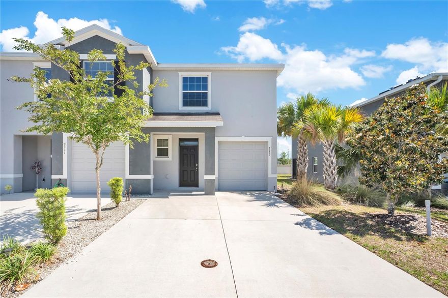 One or more photo(s) has been virtually staged. Welcome to this beautifully maintained newer-construction townhome located in the growing Wildwood area, just minutes from The Villages, shopping, dining, and major highways for an easy commute. Built in 2021, this spacious 3-bedroom, 2.5-bath residence offers approximately 1,758 square feet of comfortable living space with an open-concept layout designed for both everyday living and entertaining.

The home features a bright and functional kitchen overlooking the living and dining areas, generous bedroom sizes, and a private garage for added convenience. The primary suite offers a relaxing retreat with ample space and storage, while the additional bedrooms provide flexibility for guests, a home office or growing households.

Perfect for first-time homebuyers, seasonal residents, or investors, this property combines modern construction with low-maintenance living at an attractive price point. Conveniently located near I-75, Florida’s Turnpike, shopping centers, restaurants, medical facilities, and the expanding growth corridor of Wildwood, this home presents an exceptional opportunity to own in one of Central Florida’s rapidly developing areas.