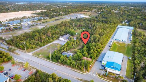 Photo of 3021 Howland Boulevard, Deltona, FL 32725 (MLS # V4948547)