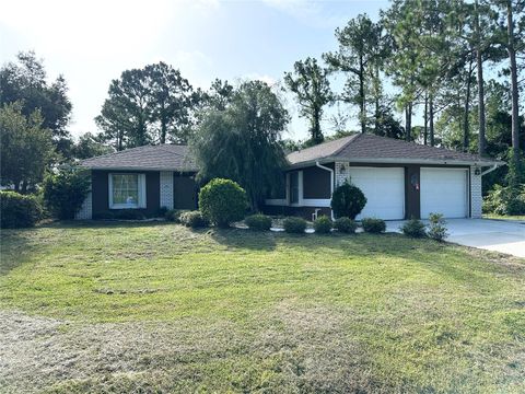 Photo of 26 Woodbury Drive, Palm Coast, FL 32164 (MLS # FC309640) Photo of 26 Woodbury Drive, Palm Coast, FL 32164 (MLS # FC309640)