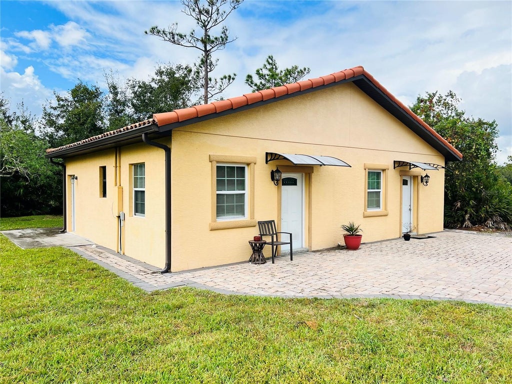 Photo of 6778 New Hope Road #A, Orlando, FL 32824 (MLS # O6442802)