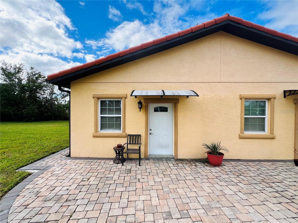 Photo of 6778 New Hope Road #A, Orlando, FL 32824 (MLS # O6442802)
