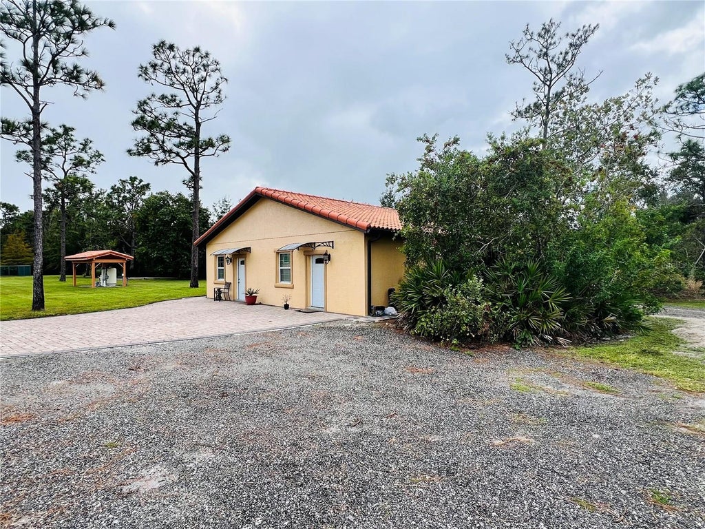 Photo of 6778 New Hope Road #A, Orlando, FL 32824 (MLS # O6442802)